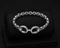 14K Gold Plated Interlocking Center Hinged Bangle Bracelet