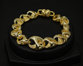 14K GOLD PLATED SCULPTURAL TWISTED MAGNETIC DESIGNER INSPIRED BRACELET